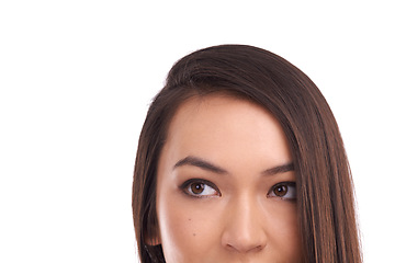 Image showing Face of a model looking up at mockup space in a studio for product placement or marketing. Beauty, young and natural woman from Asia with empty mock up for advertising isolated by a white background.
