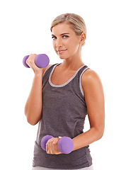 Image showing Woman, dumbbells and studio portrait for wellness, muscle development and health by white background. Weightlifting model, vision and isolated for training, workout and exercise for strong body goals