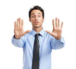 Image showing Stop, problem and portrait hands of a businessman with a sign, serious signal and command on a white background. Palm, opinion and executive man with a no hand gesture, negative and bad expression