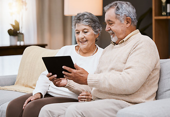 Image showing Tablet, relax or old couple streaming a movie or film on online subscription in retirement at home. Love, internet or senior woman enjoys fun movies with a happy elderly partner on living room sofa