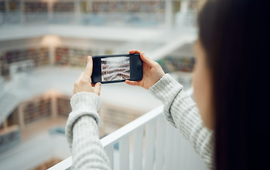 Image showing Library, student and woman taking pictures with phone for social media. Education scholarship, tech and female taking photo with mobile smartphone for online profile or college memory in university.