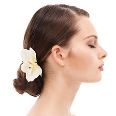 Image showing Woman face, profile or beauty skincare and orchid flower, makeup cosmetics or dermatology healthcare wellness. Zoom, model or facial glow with plant, healthy collagen or hairstyle on white background