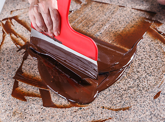 Image showing Tempering melted chocolate