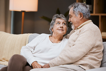 Image showing Love, sofa and senior couple talking, marriage and bonding for relationship, retirement and romance. Romantic, elderly man and mature woman in living room, conversation and relax on weekend break.