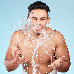 Image showing Cleaning, water splash and portrait of man happy with self care routine, facial hygiene and body hygiene wash. Water drop, bathroom skincare hydration and beauty model with health wellness treatment