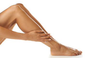 Image showing Skin, legs and woman in studio for beauty, wellness and grooming against a white background. Skincare, leg and model feeling perfect, smooth and glowing, satisfaction and luxury routine for body care