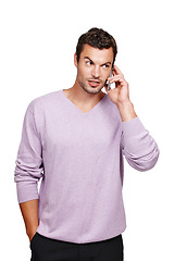 Image showing Man, phone call conversation and thinking in studio for online discussion, mobile communication and talking in white background. Person, standing casual and speaking on smartphone isolated in studio