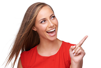 Image showing White background, pointing finger and face of woman for fashion, marketing and advertising. Beauty, retail and girl model with copy space for deal, sale and product placement isolated in studio