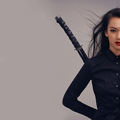 Image showing Samurai, ninja and portrait of woman with sword in studio isolated on gray background mockup. Face, sports and martial arts of young female warrior with blade ready for workout, training or exercise.