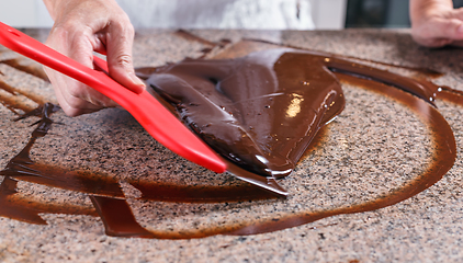 Image showing Tempering of the chocolate