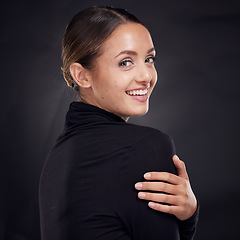 Image showing Skincare, portrait or woman in studio with a happy smile after facial grooming routine isolated on black background. Beauty glow, face or girl model smiling with marketing or advertising mockup space