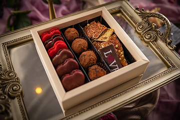 Image showing Assortment of luxury bonbons in box