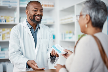 Image showing Healthcare, pharmacist and woman at counter with medicine or prescription drugs in hands at drug store. Health, wellness and medical insurance, man and customer at pharmacy for advice and pills.