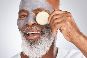 Image showing Skincare, face mask or old man portrait with cucumber marketing or advertising natural vegan diet for glowing skin. Cream, happy, senior black man with beauty or healthy anti aging facial cosmetics