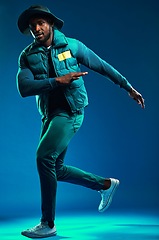 Image showing Fashion, neon and portrait of black man on blue background with cool, trendy and stylish outfit. Creative style, urban clothing and male fashion model in studio with designer, modern and edgy clothes