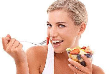 Image showing Diet, fruit and portrait of woman with salad, eating healthy and happy isolated on white background. Health, fruit salad and nutrition, beautiful happy woman with fruit and nutritional food in studio