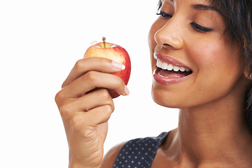 Image showing Organic, healthy and black woman with apple ready for nutrition and health food for diet with mock up. Natural, fruit and hungry model with happy smile about snack for weight loss with mockup