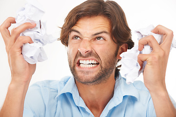 Image showing Angry, business man and burnout with tax documents and frustrated worker with white background. Isolated, overworked and anger about mistake with audit paperwork and mental health problem from work