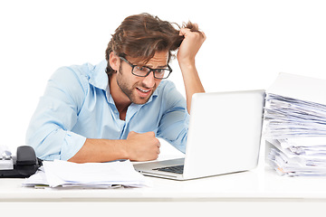 Image showing Laptop, stress and documents with a business man frustrated in studio on a white background for work. Computer, paper and pulling hair with a male employee feeling overwhelmed while working online