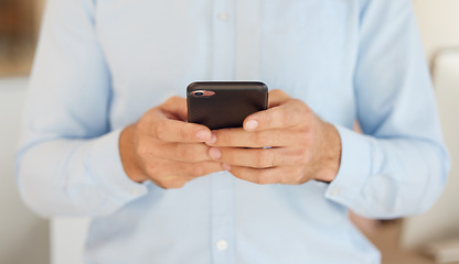 Image showing Hands, using phone and businessman with texting, closeup and social media app for digital networking on web. Smartphone, chat and man in office, mobile and typing on social network, email or internet