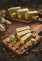 Image showing Raw homemade white chocolate with pistachio