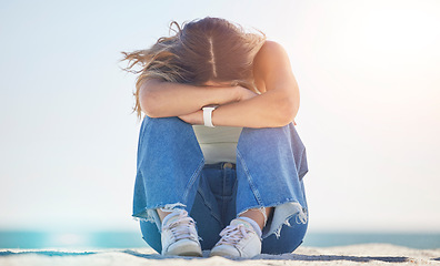 Image showing Sad woman, stress or depression by beach, ocean nature or sea environment and bipolar, psychology crisis or mind crisis. Mental health, anxiety or mind burnout person in mistake fear, risk or problem