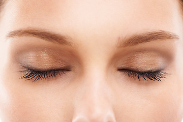 Image showing Woman face, closed eyes or makeup cosmetics in beauty skincare, self love routine or product tutorial. Zoom, macro or model and facial eyeshadow, mascara or microblading eyebrows and healthy collagen