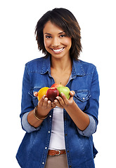 Image showing Portrait, happy or black woman with an orange or apple in studio on white background excited with vegan diet. Smile, vitamin c or healthy African girl model with pride or organic fruit fo self care