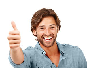 Image showing Thumbs up, OK and man with smile, portrait with hand sign, yes and thank you with feedback against white background. Happy man, agreement and success with motivation for winner and vote in portrait