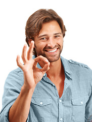 Image showing Man smile in portrait with OK hand sign, agreement or good review, feedback and emoji against studio background. Yes gesture, success and happy vote with approval and male voice positive opinion