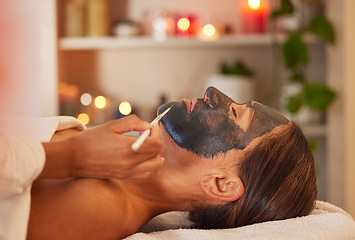 Image showing Spa, woman and charcoal face mask, skincare and face detox for health, wellness and clear skin. Beauty, cosmetics and girl with organic facial, luxury and detox for confidence, and relax treatment