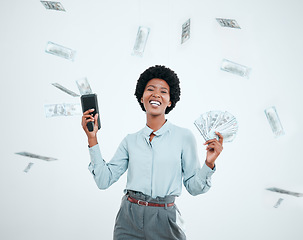 Image showing Cash cannon, money rain and wealth with a black woman winner in studio on a gray background. Portrait, winning or finance with a female employee shooting bank notes in celebration of profit