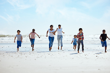 Image showing Summer, beach and a group of children running on sand, friendship and fun on ocean holiday. Friends, kids and energy in youth, happy boys and girls on vacation in playful race together at the sea.