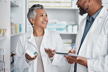 Image showing Pharmacy, doctors or pharmacist with medicine for stock, inventory or supplements products check. Tablet, teamwork or happy senior healthcare people working or speaking of pills or medical drugs