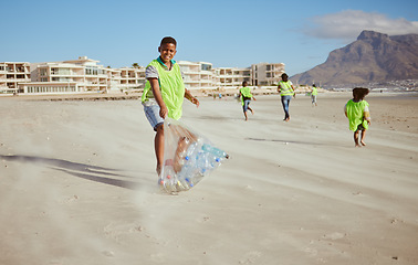 Image showing Boy, portrait and trash collection bag in beach waste management, ocean clean up or sea community service. Happy kids, climate change and cleaning volunteering plastic for nature recycling for school