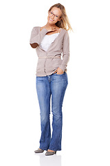 Image showing Fashion, casual and portrait of a woman model in studio with a feminine trendy and natural outfit. Happiness, smile and full body of female with glasses and stylish clothes posing by white background