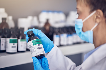 Image showing Hand, covid and medical vaccine with a nurse working in a hospital or clinic for treatment in the pandemic. Healthcare, insurance and bottle with a female medicine professional at work during corona