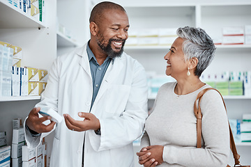 Image showing Medicine, shopping or pharmacist helping an old woman with healthcare advice on medical pills or drugs. Smile, customer or happy senior doctor talking or speaking to a sick elderly person in pharmacy