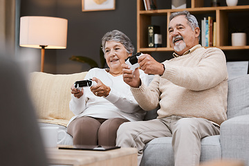 Image showing Video game, sofa and senior couple with gaming online in home for happy holiday, retirement and lifestyle together with technology. Excited, elderly and gamer people on a couch with living room games