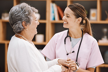 Image showing Healthcare, insurance and a senior woman patient and nurse consulting during a checkup in a retirement home. Medical, support and wellness with a medicine professional talking to a mature female