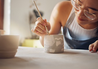 Image showing Woman, pottery studio and painting workshop for sculpture product, creative manufacturing and design startup. Painter, ceramics and brush process, artistic pattern and production in small business