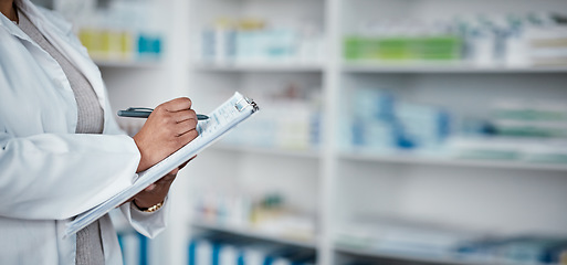 Image showing Woman, hands or pharmacy clipboard writing for medical stock check, medicine product research or pills prescription order. Zoom, pharmacist or healthcare worker with paper documents in retail store