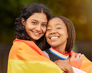 Image showing Lesbian, couple and women hug, lgbtq relationship with smile together and commitment with flag and pride in portrait. Happy, equality in sexuality and freedom to love, lgbt community and diversity