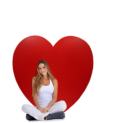 Image showing Heart, love and portrait of relax woman with big red object, romantic product or emoji icon for Valentines Day holiday. Beauty, happy smile and model girl with studio care symbol on white background