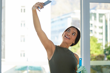 Image showing Woman, cleaning service and selfie with phone for digital marketing, social media advertising or a post while in a house or apartment. Female using mobile app while spring cleaning with happiness