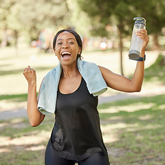 Image showing Fitness, excited and portrait of a black woman in nature for celebration, wellness or exercise. Happy, smile and healthy African female athlete celebrating her workout, training or sport achievement.