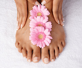 Image showing Flowers, beauty and woman hands with feet, manicure and pedicure spa treatment zoom with nails and healthy skin. Natural cosmetics with organic skincare, nature and cosmetic care with wellness