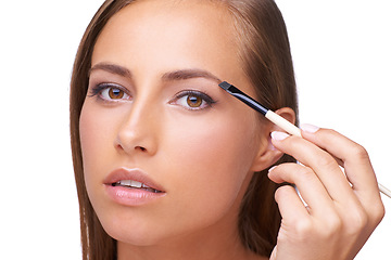 Image showing Woman, face and makeup with eyebrow and brush for beauty, microblading and mascara on white background. Portrait, lashes and eyes with cosmetic care and cosmetics tools with skincare in studio