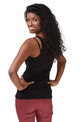 Image showing Portrait, back and fashion with an indian woman standing hands on hips in studio on a white background. Attitude, style and beauty with an attractive young girl posing in contemporary clothes