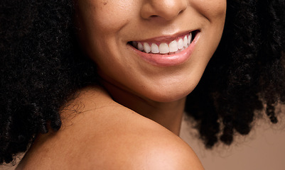 Image showing Face beauty, dental and teeth of black woman in studio isolated on a brown background. Skincare, makeup and cosmetics of happy female model with veneers, teeth whitening and invisalign for wellness.